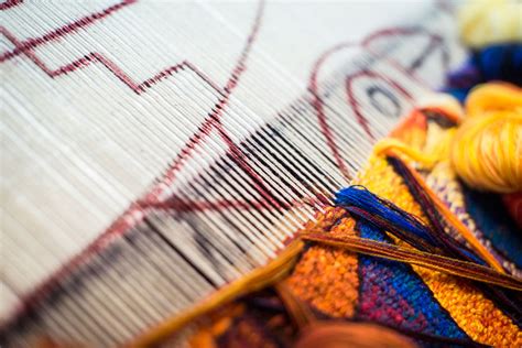 What is Fiber Art and How Does It Weave Through the Tapestry of Modern Creativity?